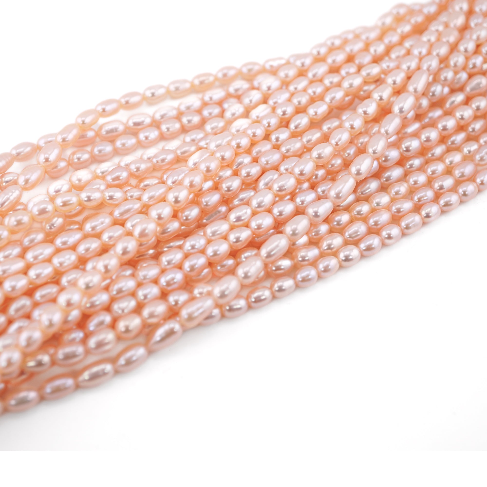 Peach Rice / Oval Freshwater Pearls Beads