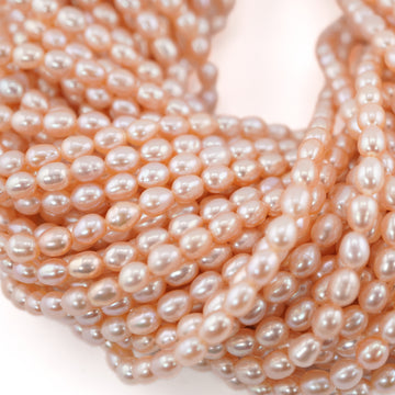 6 x 5 - 5 x 4 MM Peach Rice / Oval Freshwater Pearls Beads