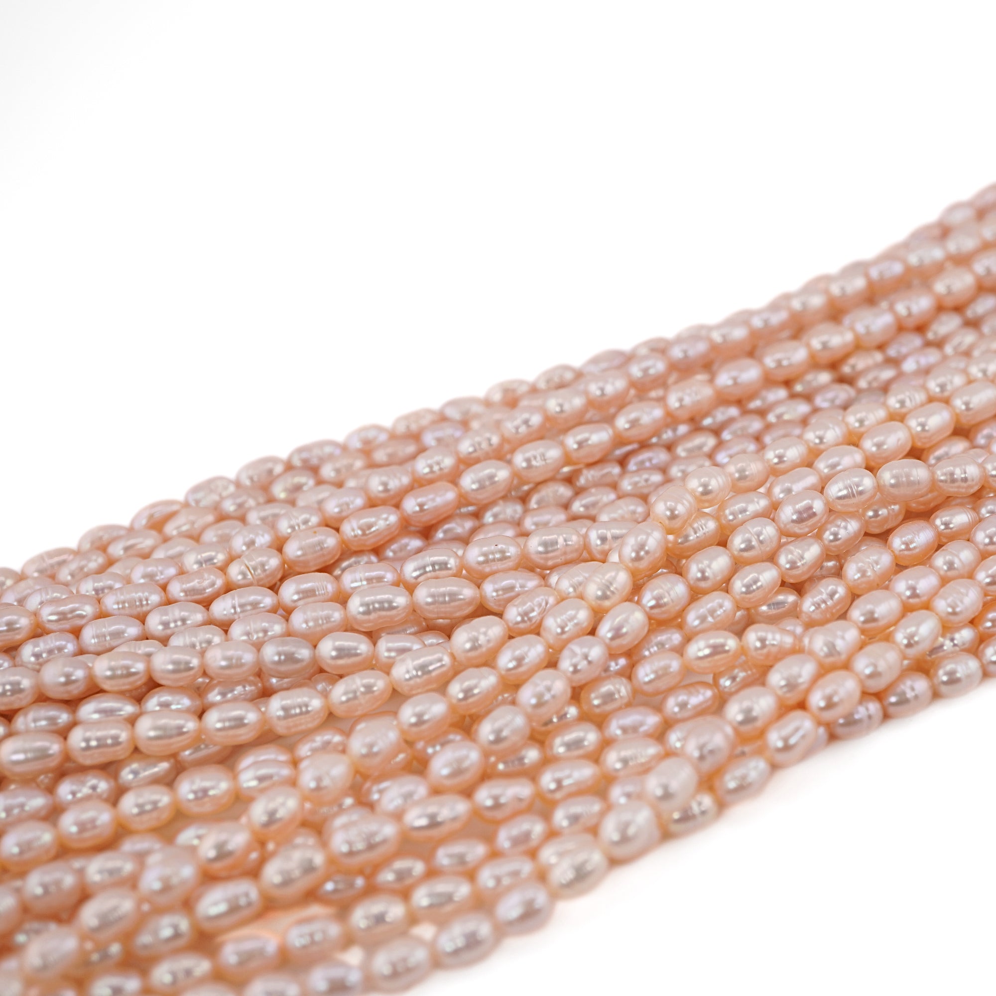 Peach Rice / Oval Freshwater Pearls Beads