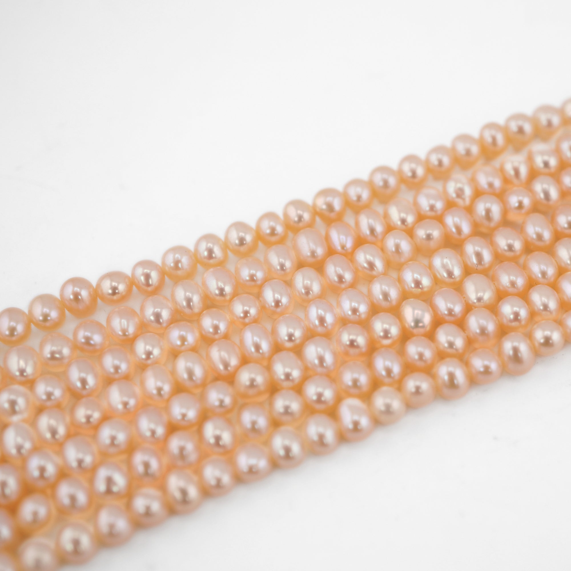 Peach Near Round Freshwater Pearls Beads