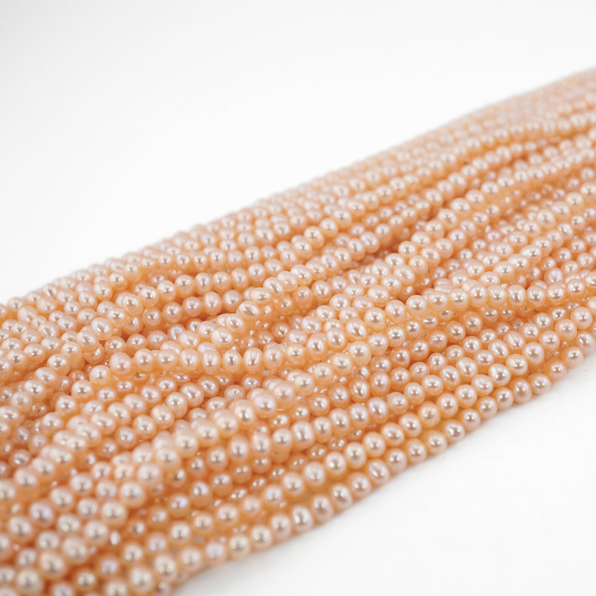 Peach Near Round Freshwater Pearls Beads