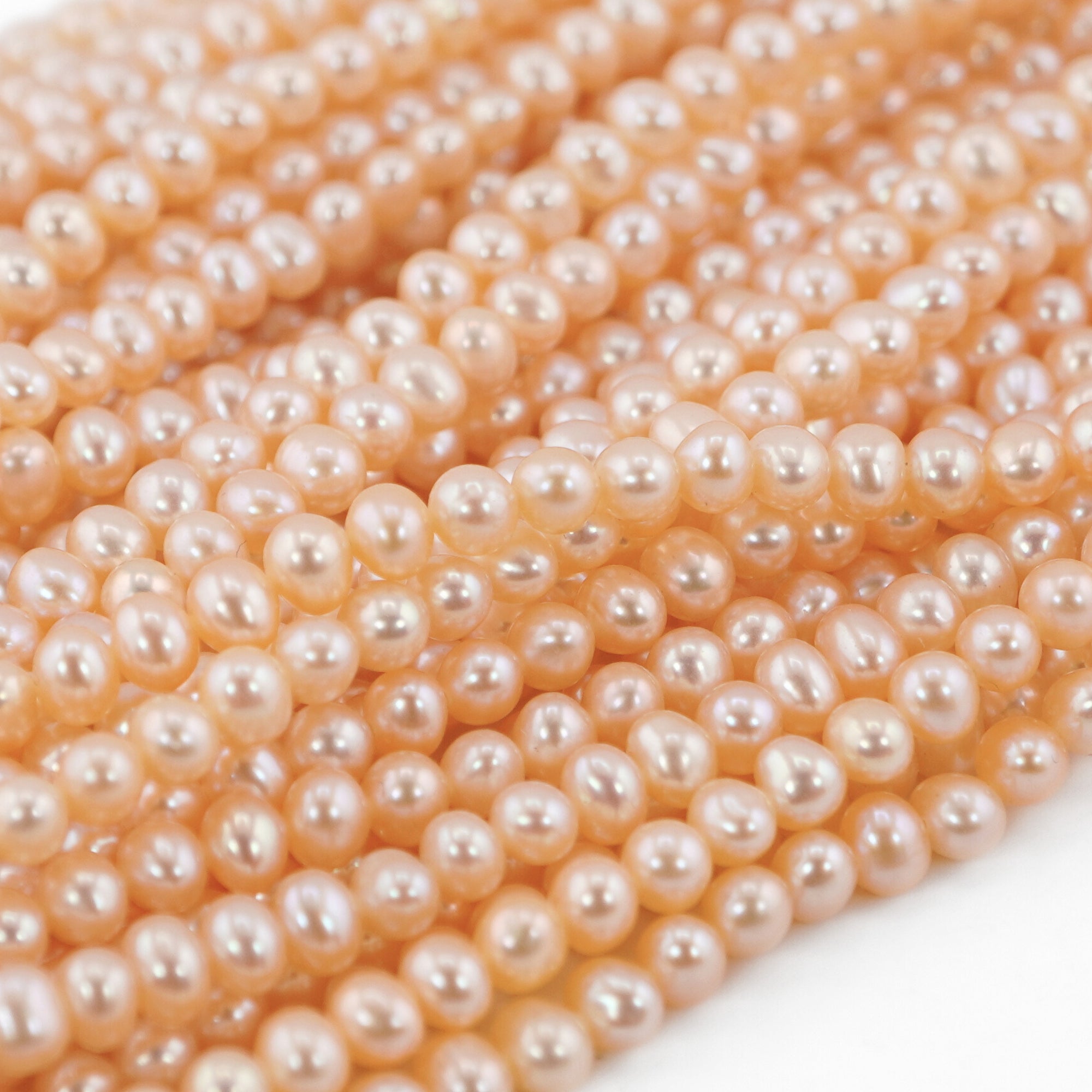 Peach Near Round Freshwater Pearls Beads