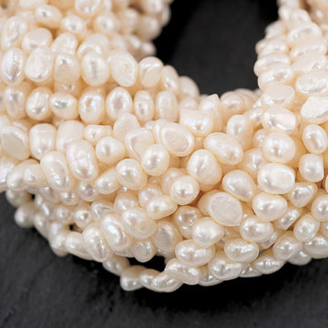 9 x 5 - 2 x 4 MM White Baroque Freshwater Pearls Beads