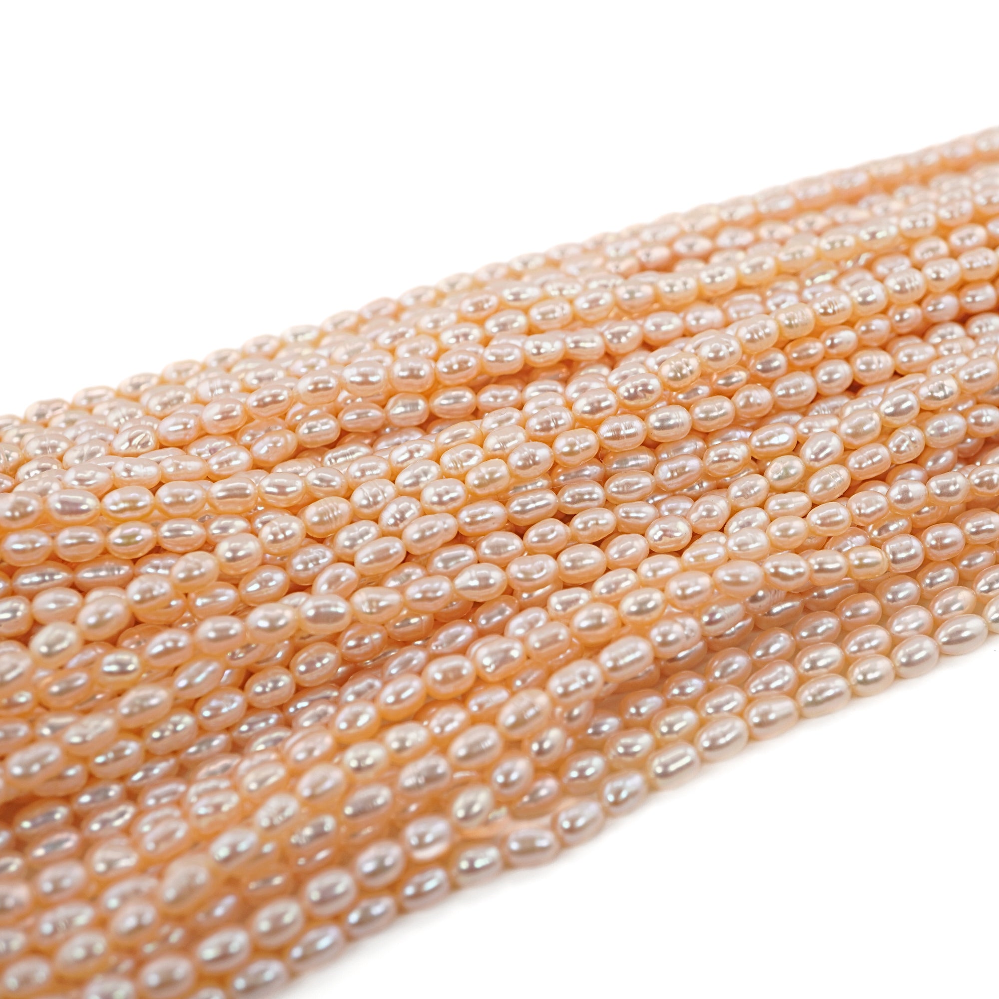 Peach Rice / Oval Freshwater Pearls Beads