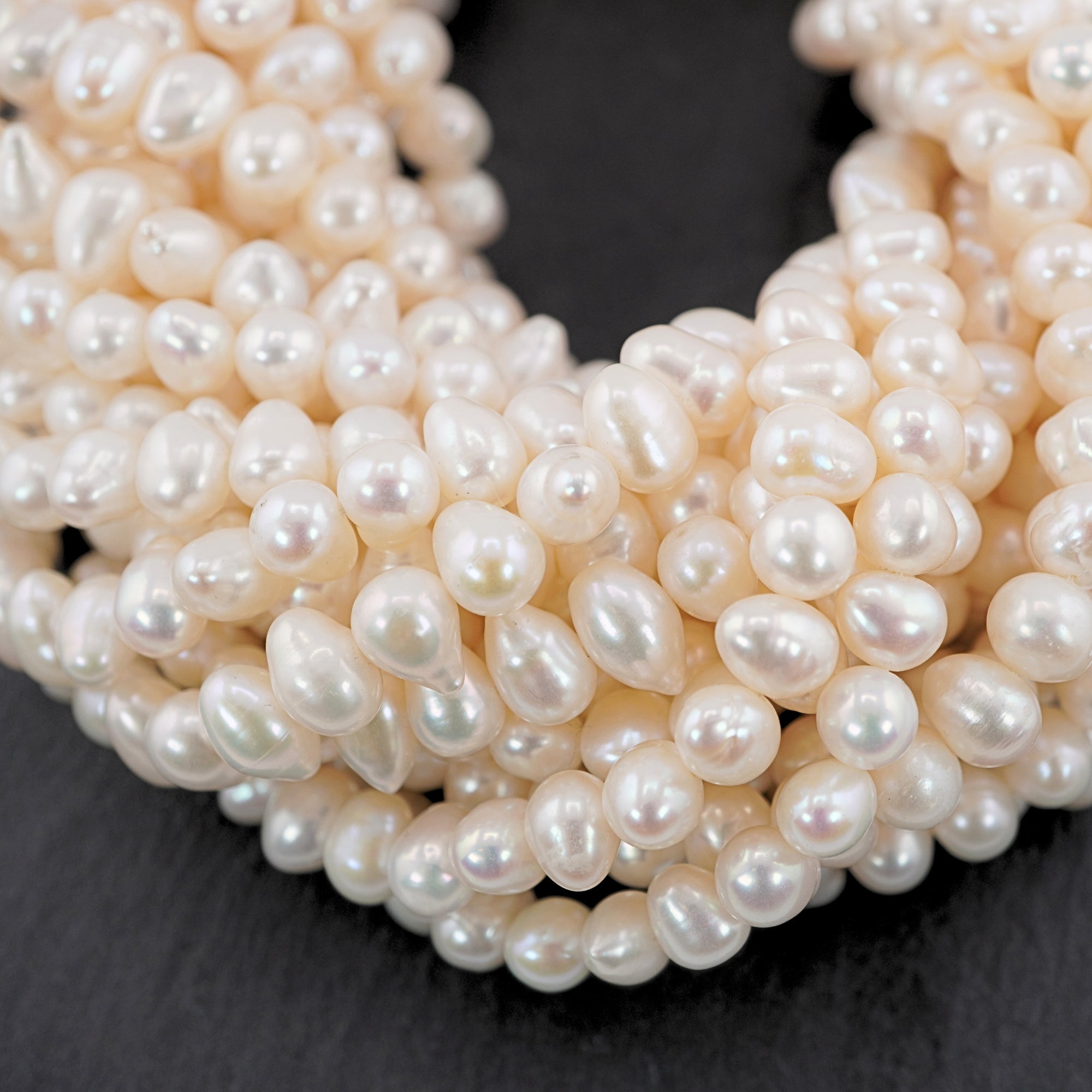 White Near Round Freshwater Pearls Beads