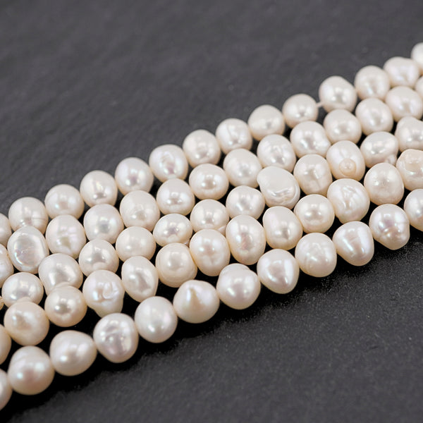 White Near Round Freshwater Pearls Beads