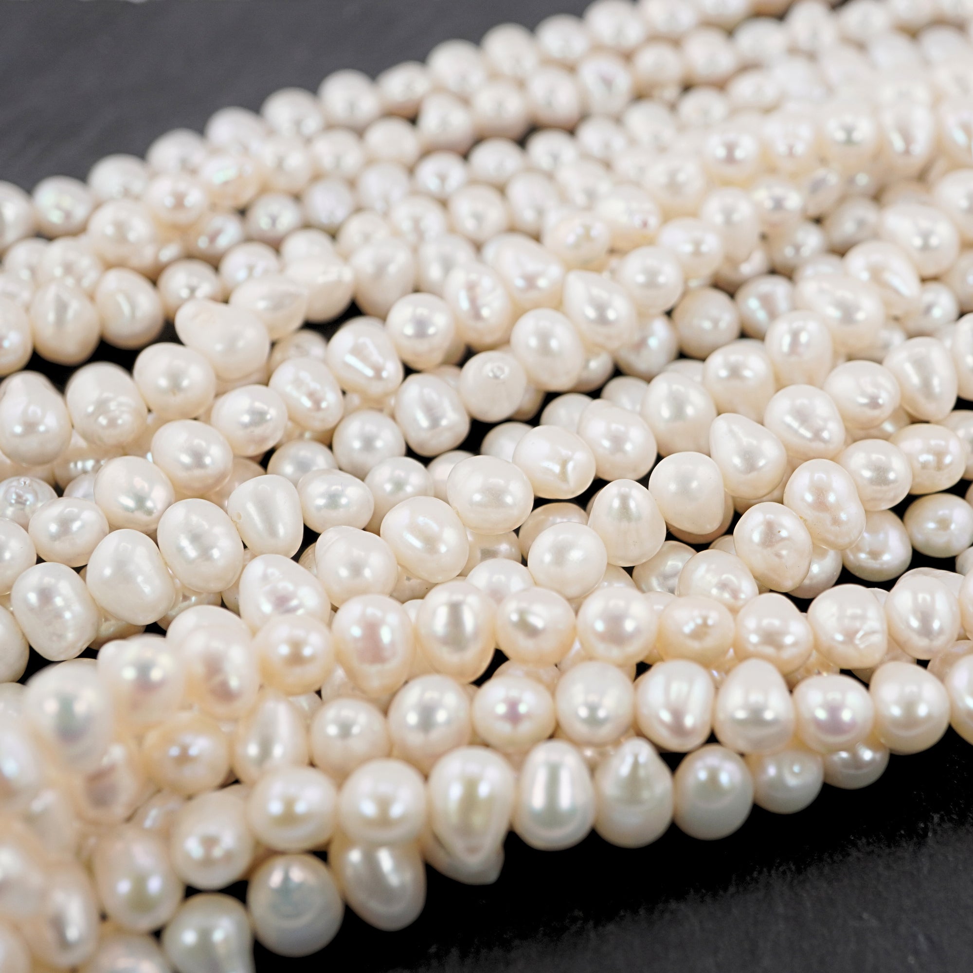 White Near Round Freshwater Pearls Beads