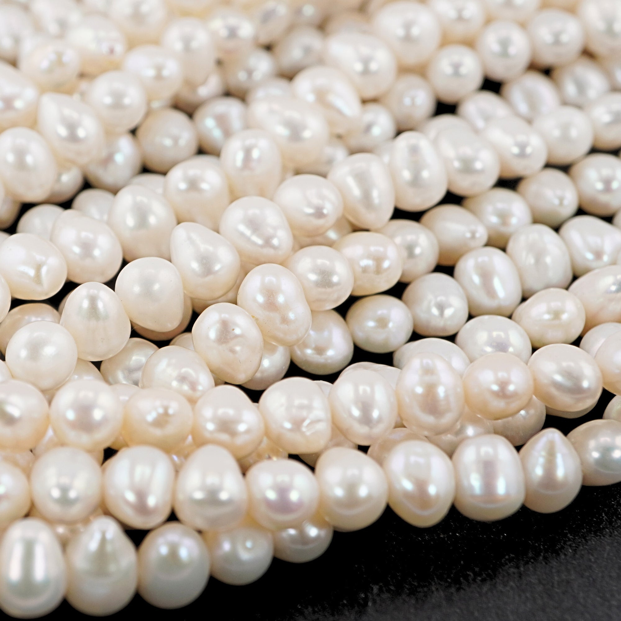 White Near Round Freshwater Pearls Beads