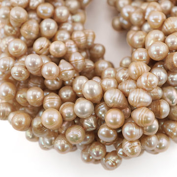 9 x 7 - 8 x 7 MM Golden Oval Freshwater Pearls Beads