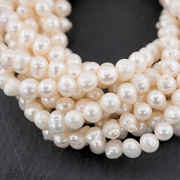 9 x 5 MM White Oval Freshwater Pearls Beads