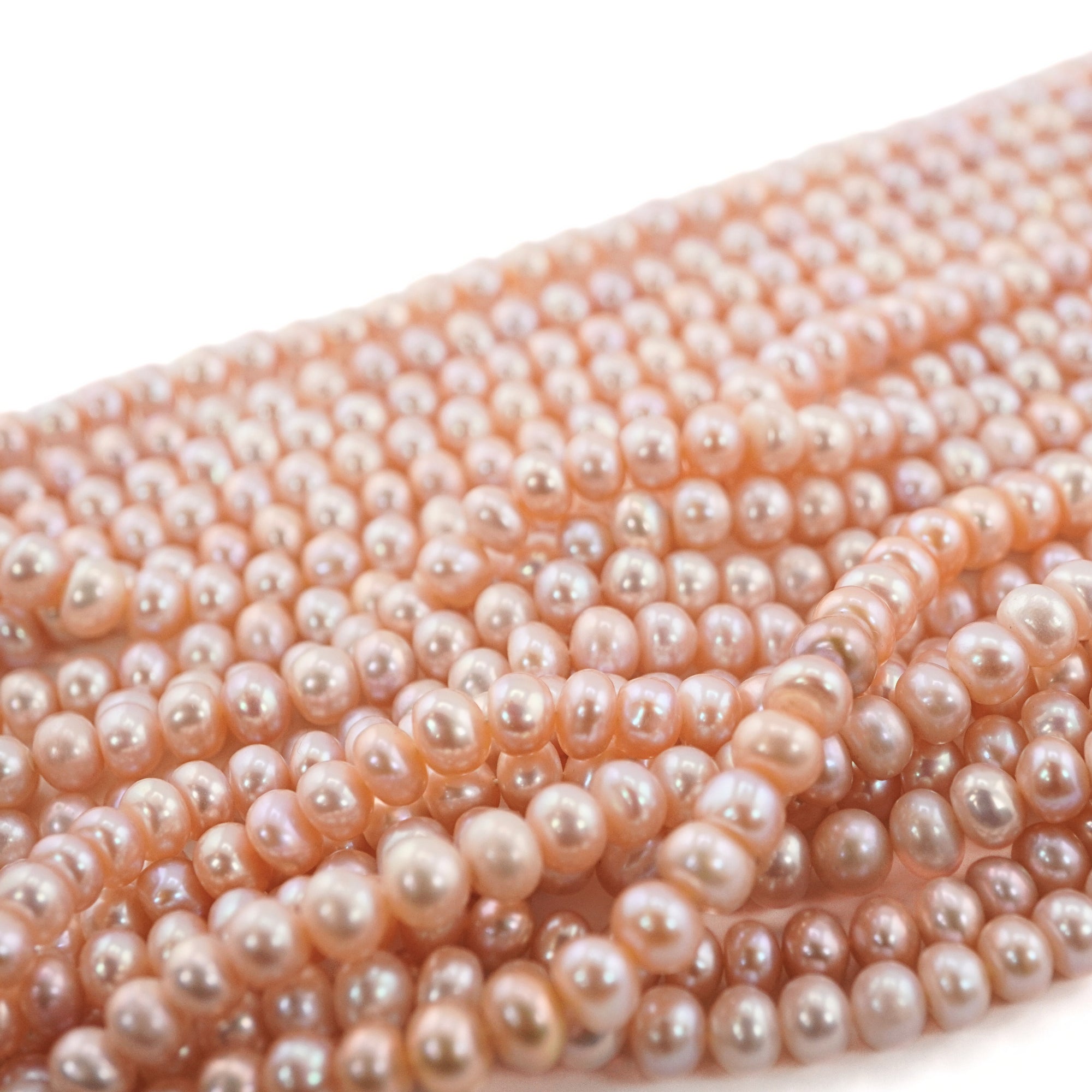 Peach Near Round Freshwater Pearls Beads