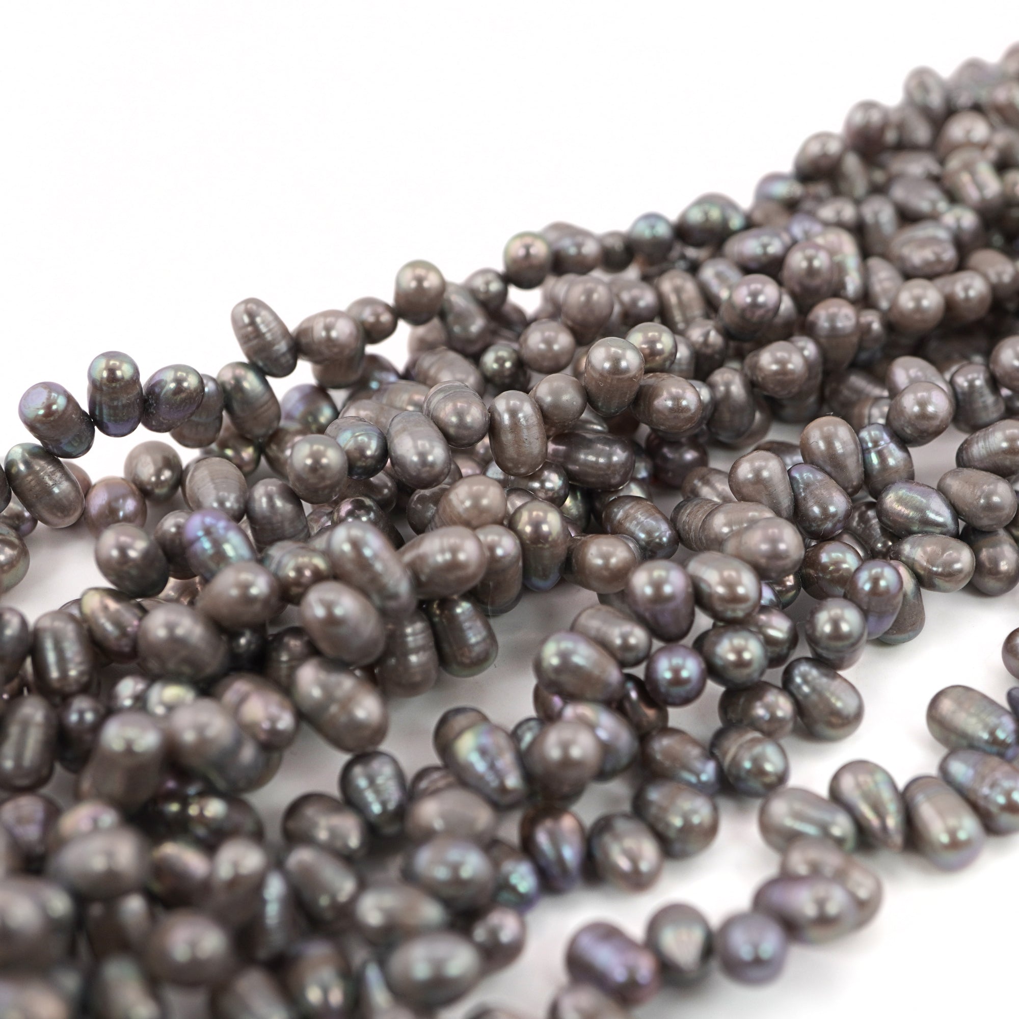 9 x 5 - 7 x 5 MM Peacock Oval Freshwater Pearls Beads