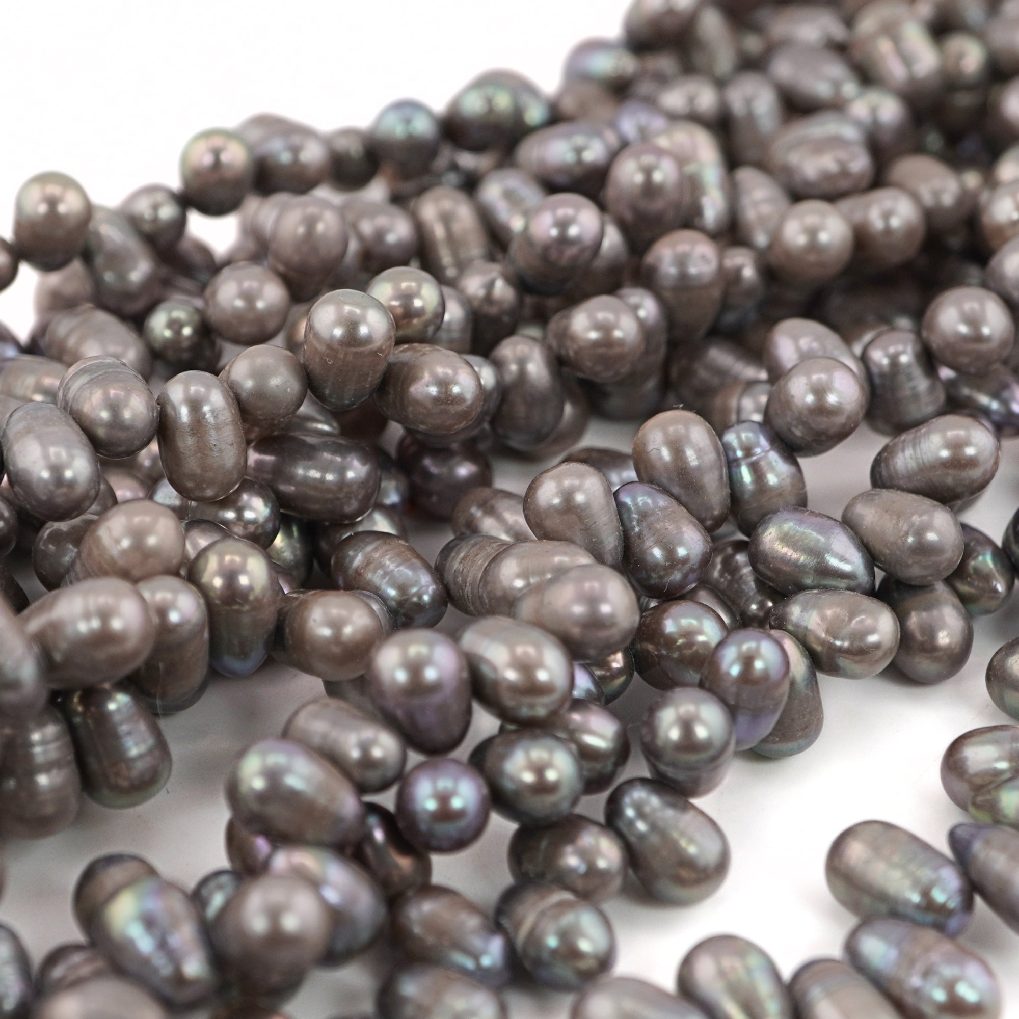 9 x 5 - 7 x 5 MM Peacock Oval Freshwater Pearls Beads