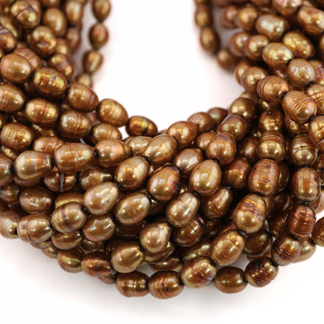 8 x 6 - 7 x 6 MM Golden Oval Freshwater Pearls Beads