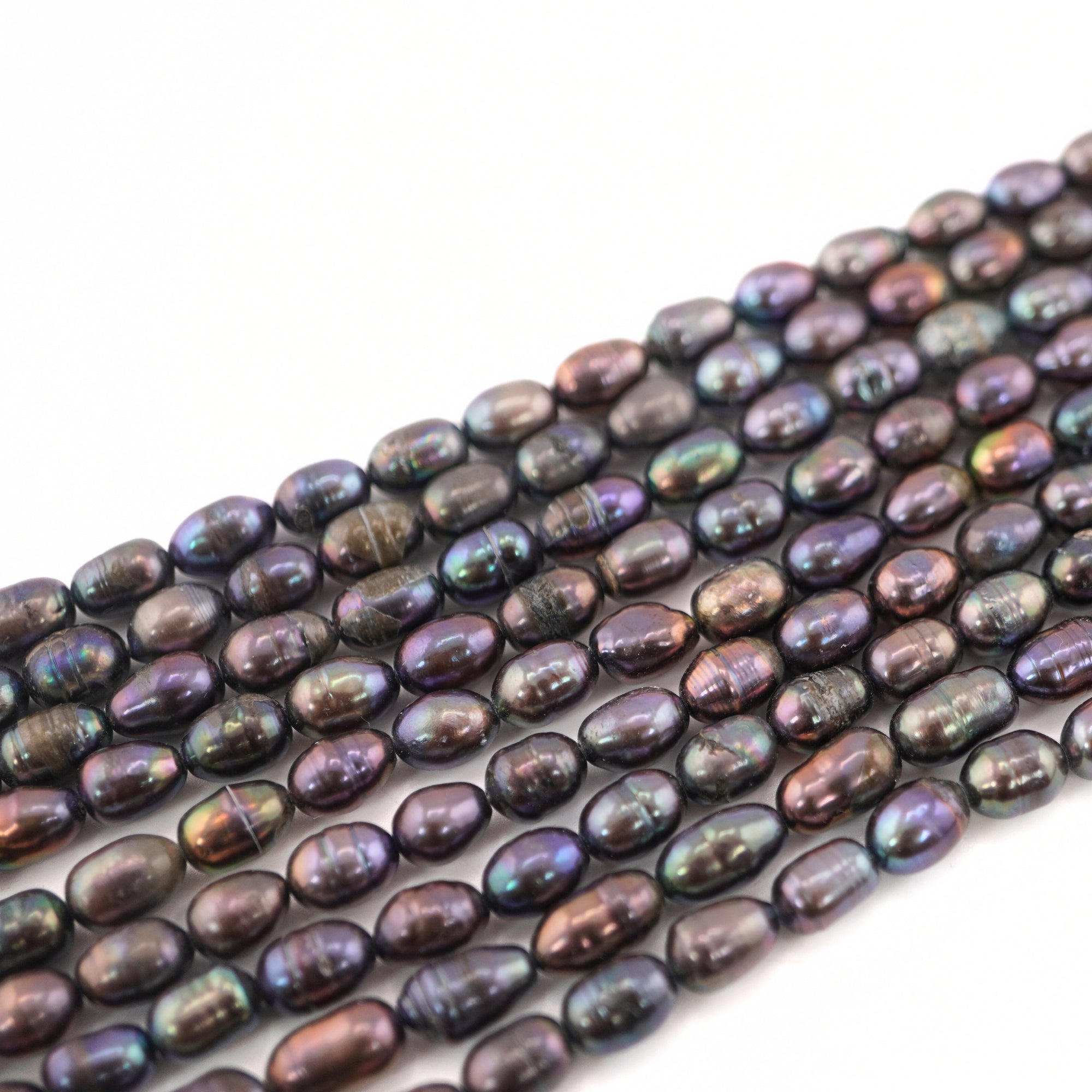 9 x 6 - 7 x 5 MM Peacock Oval Freshwater Pearls Beads