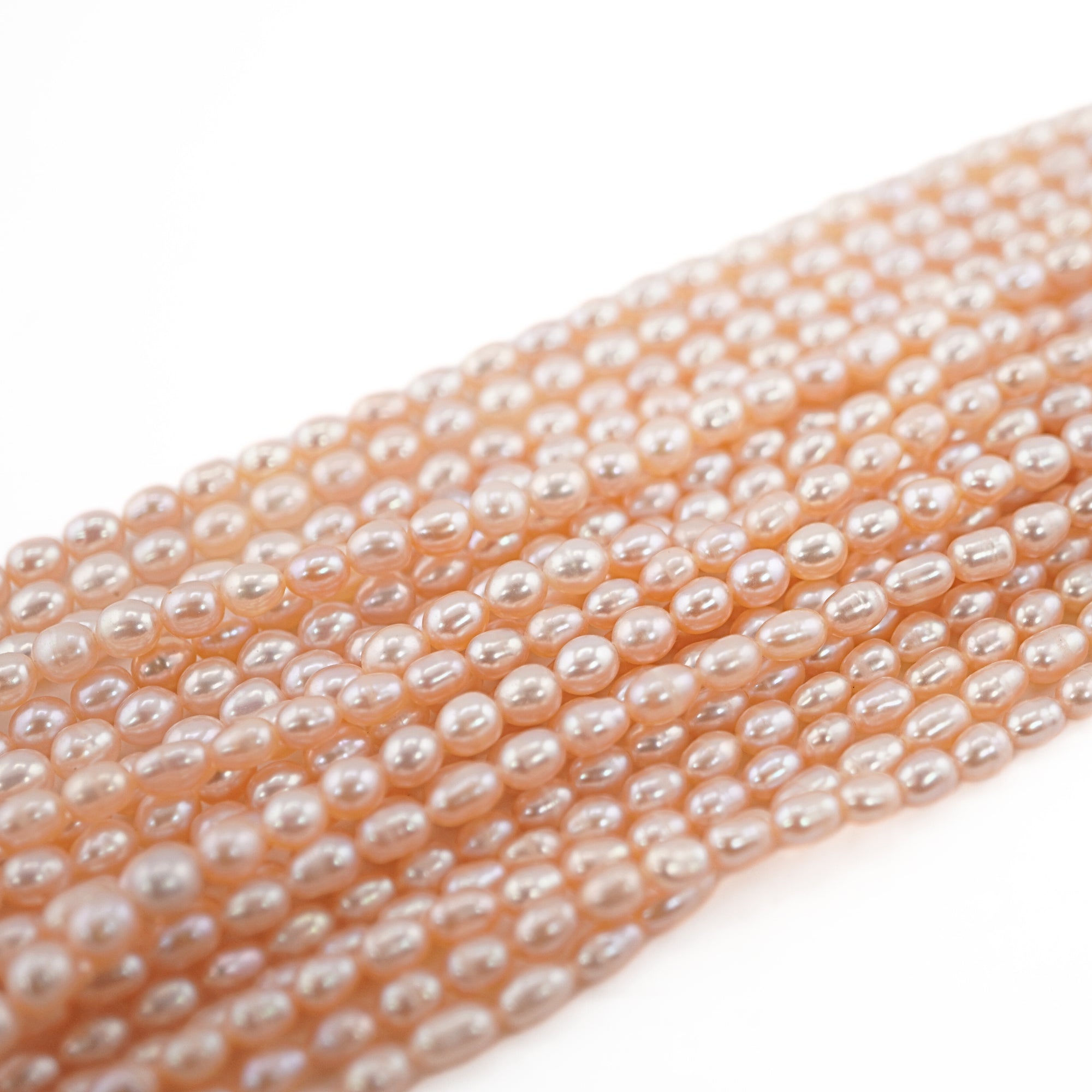 Peach Rice / Oval Freshwater Pearls Beads