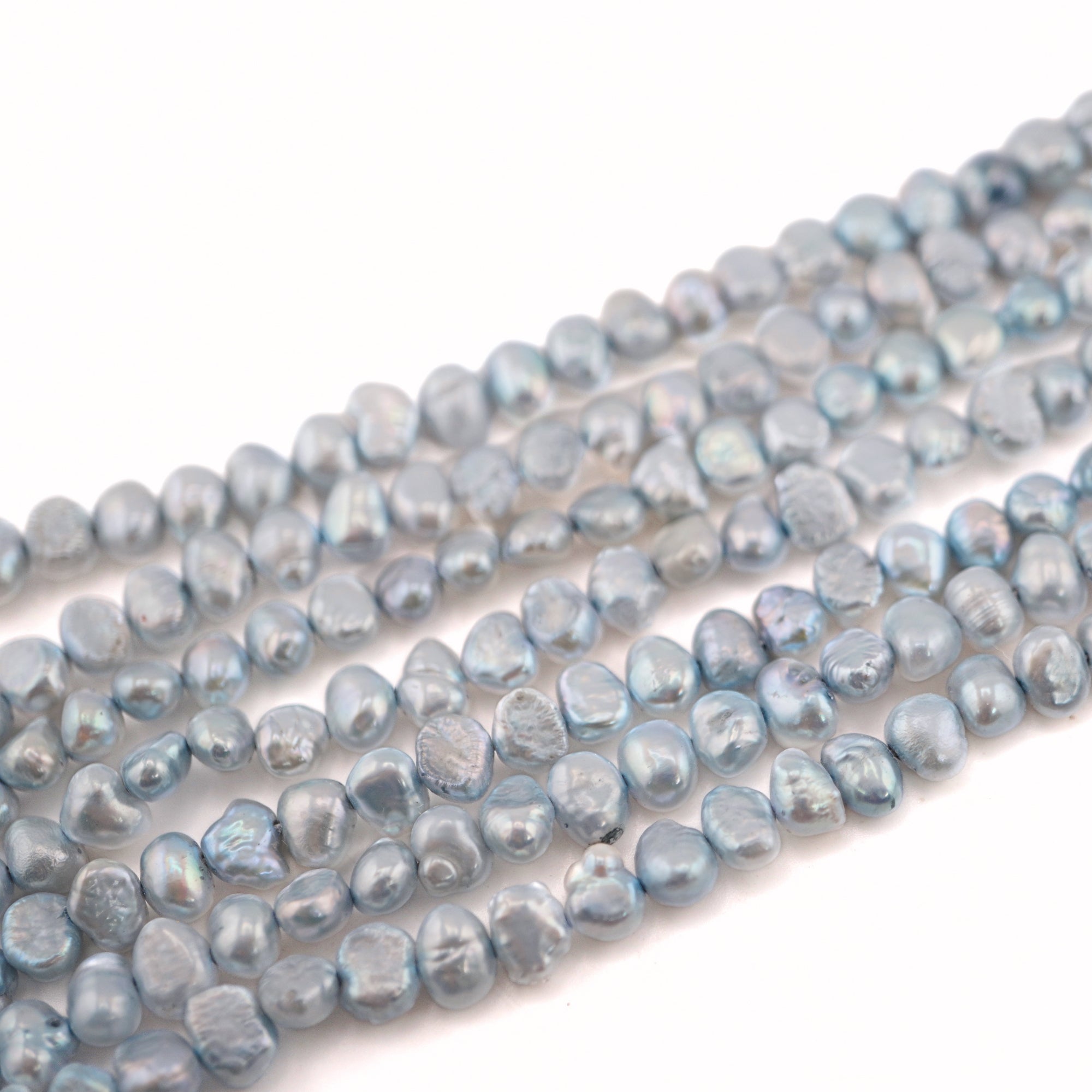 6 x 3 - 5 x 4 MM Sky Blue Baroque Freshwater Pearls Beads