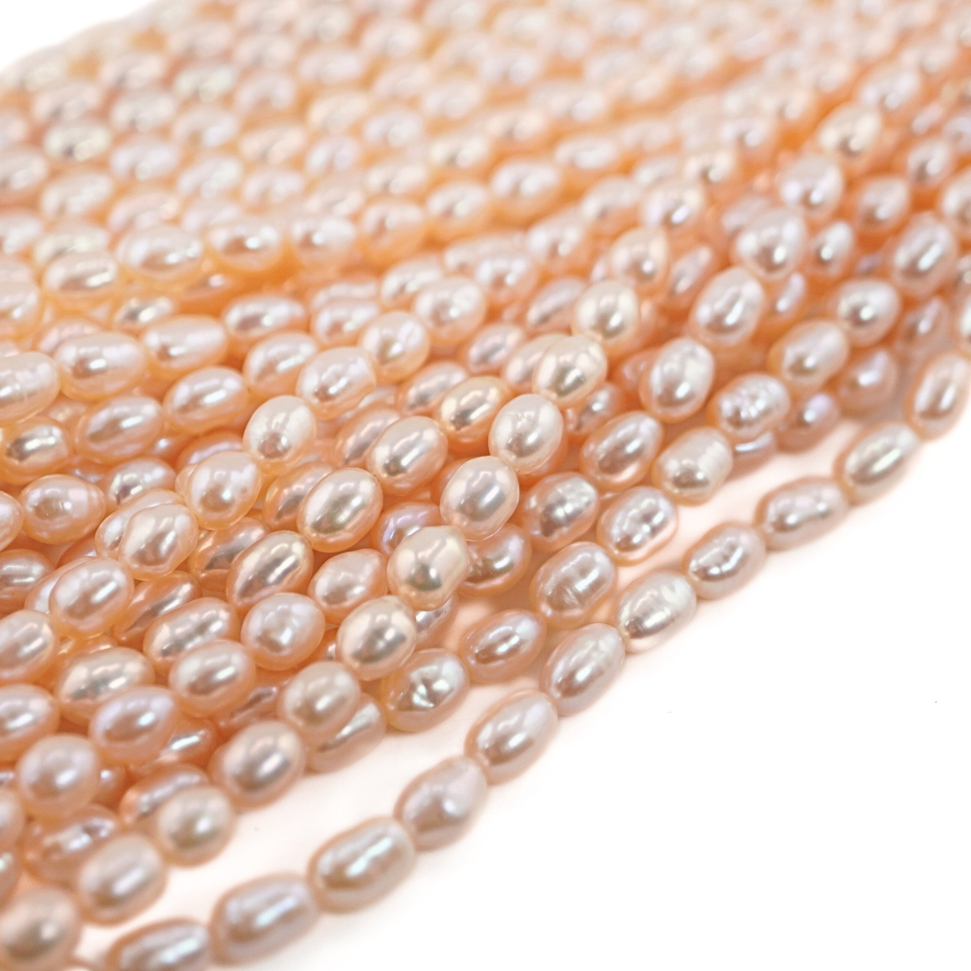 Peach Rice / Oval Freshwater Pearls Beads