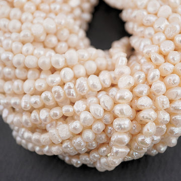 7 x 3 - 6 x 4 MM White Baroque Freshwater Pearls Beads