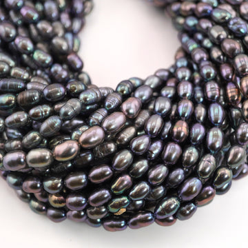 11 x 6 - 8 x 6 MM Peacock Oval Freshwater Pearls Beads