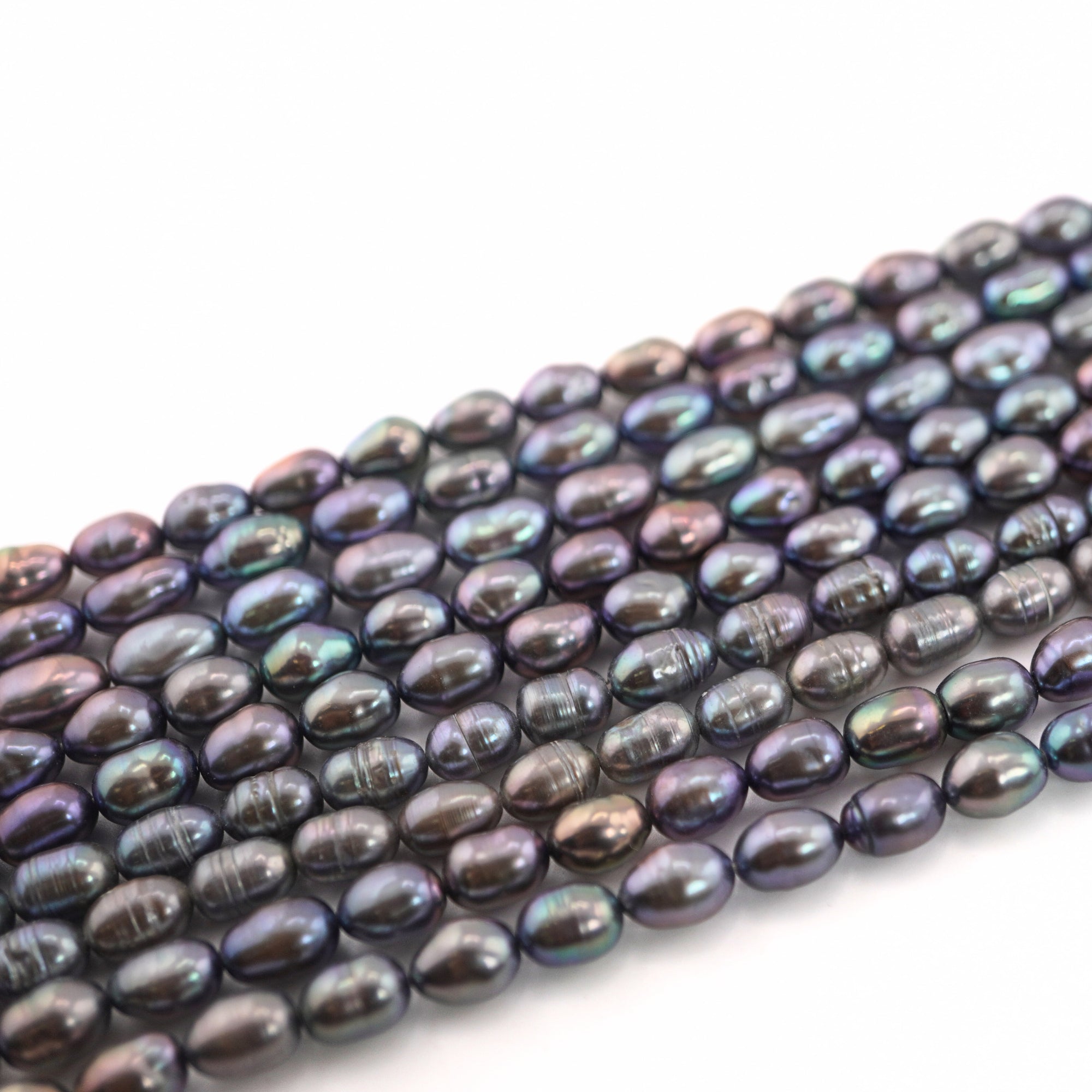 11 x 6 - 8 x 6 MM Peacock Oval Freshwater Pearls Beads