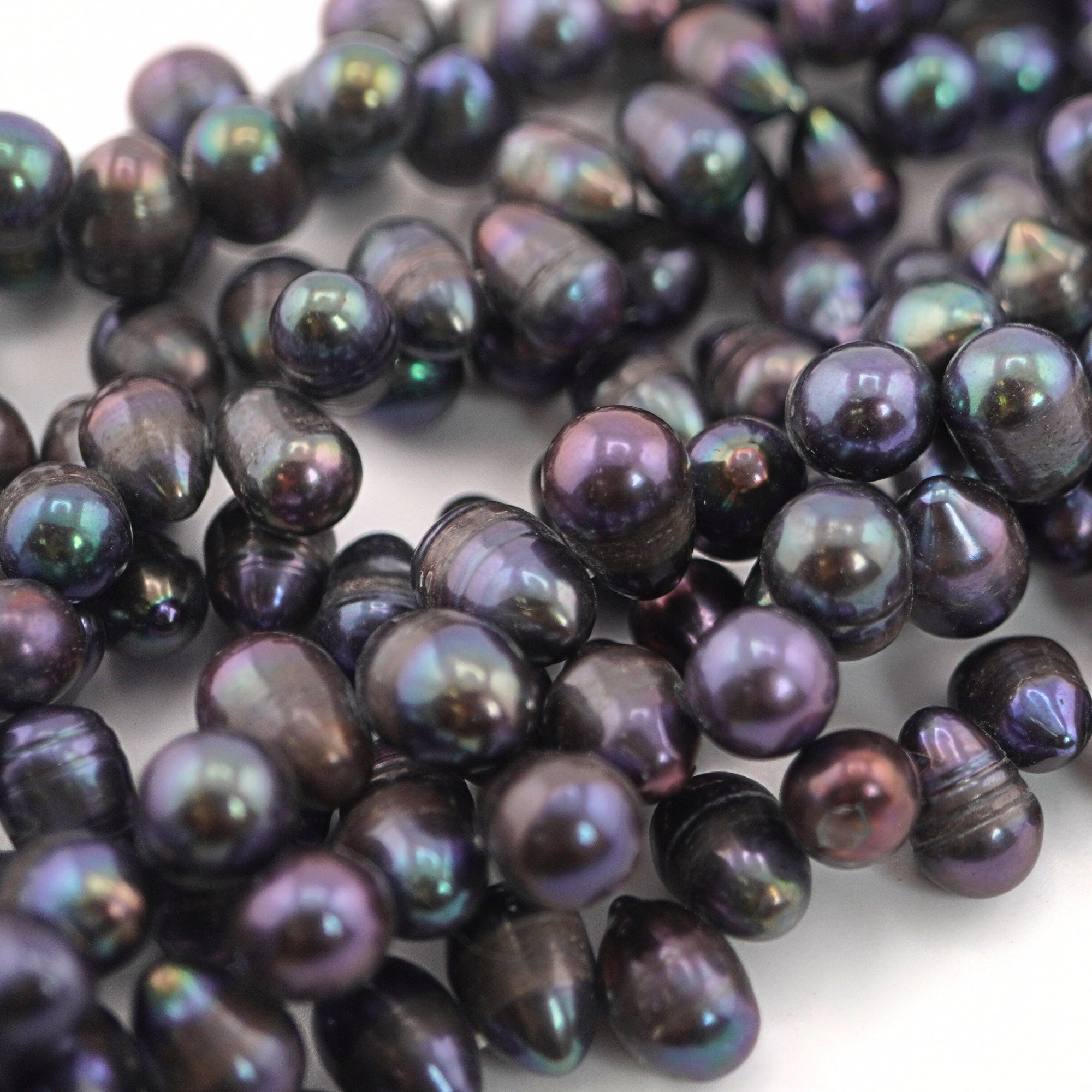 11 x 7 - 9 x 8 MM Peacock Oval Freshwater Pearls Beads