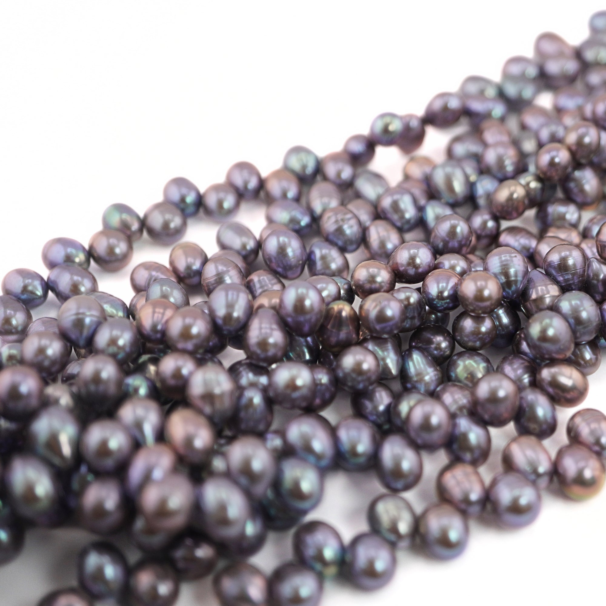 10 x 7 - 8 x 7 MM Peacock Oval Freshwater Pearls Beads