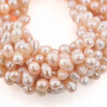 7.5 x 6.5 - 9 x 7 MM Peach Oval Freshwater Pearls Beads