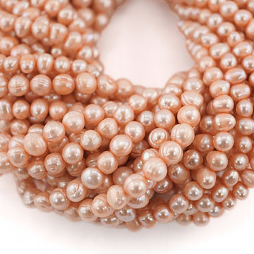 7 x 6 - 6 MM Peach Oval Freshwater Pearls Beads