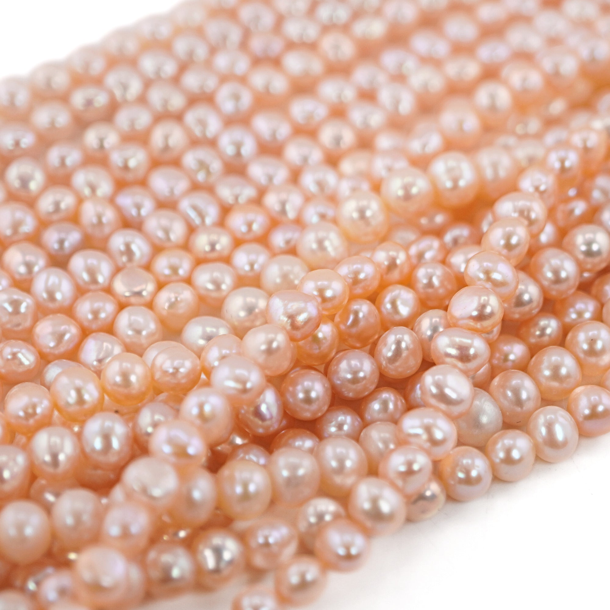 Peach Near Round Freshwater Pearls Beads