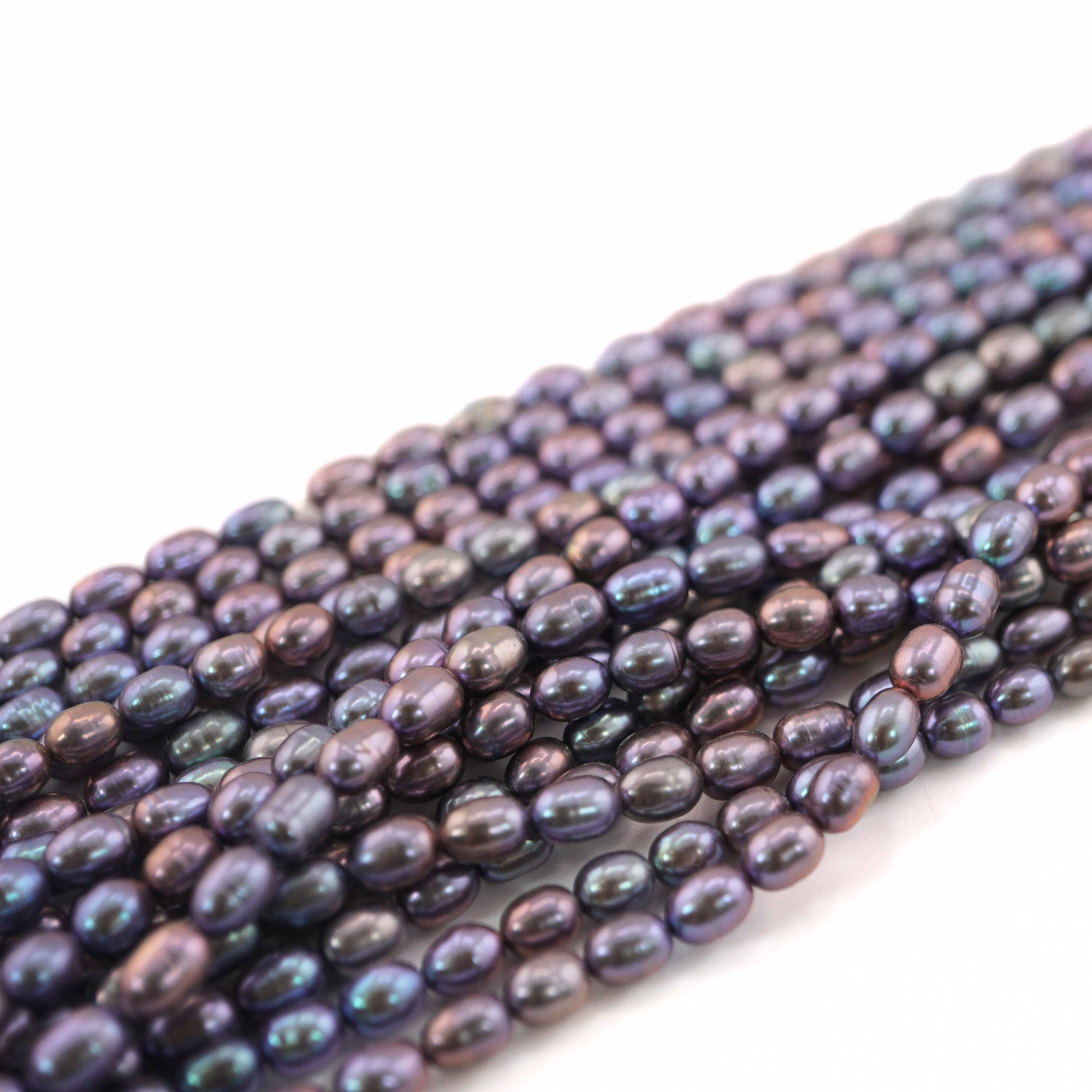 6 x 5 MM Peacock Rice / Oval Freshwater Pearls Beads