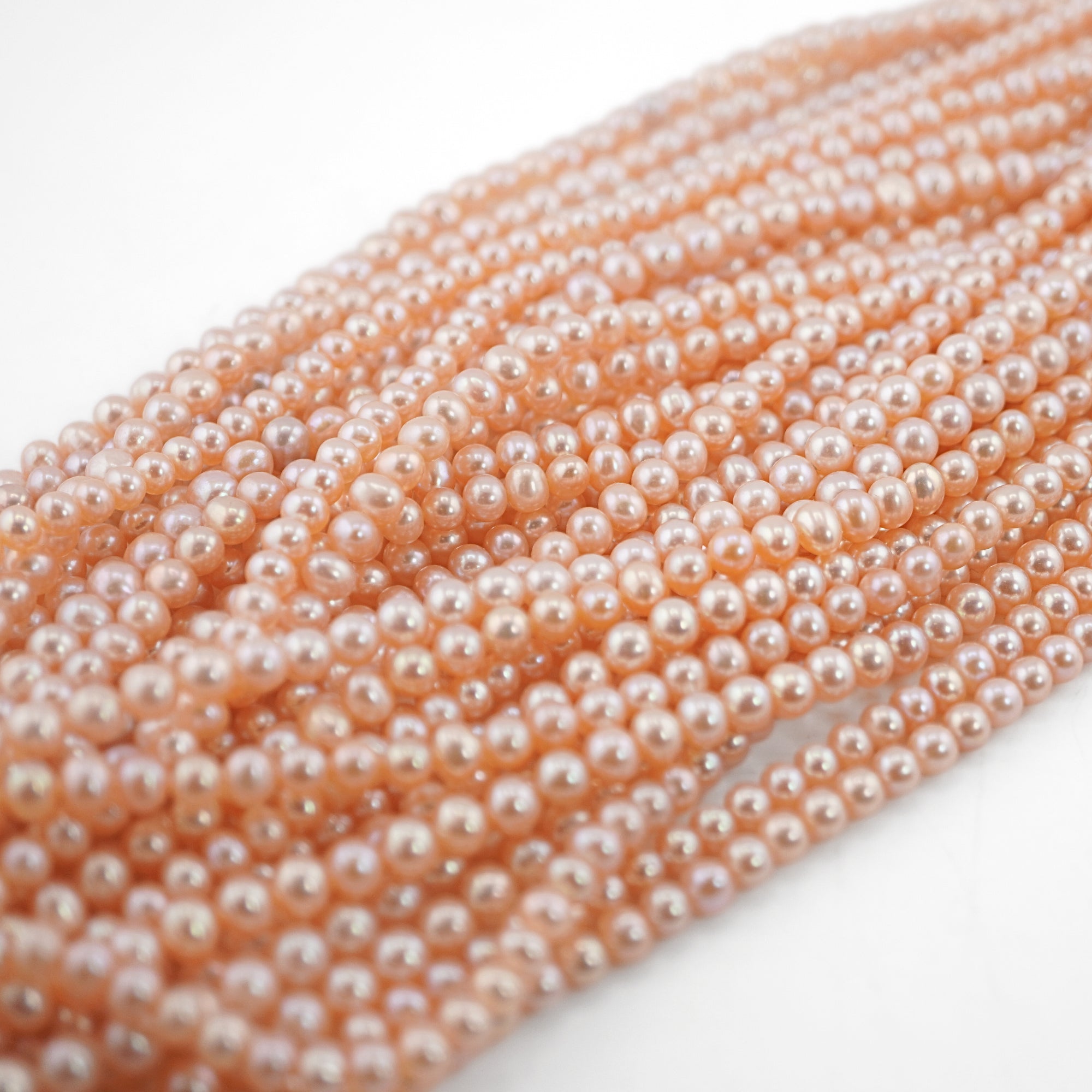 Peach Near Round Freshwater Pearls Beads