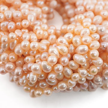 9 x 6 - 8 x 7 MM Peach Oval Freshwater Pearls Beads