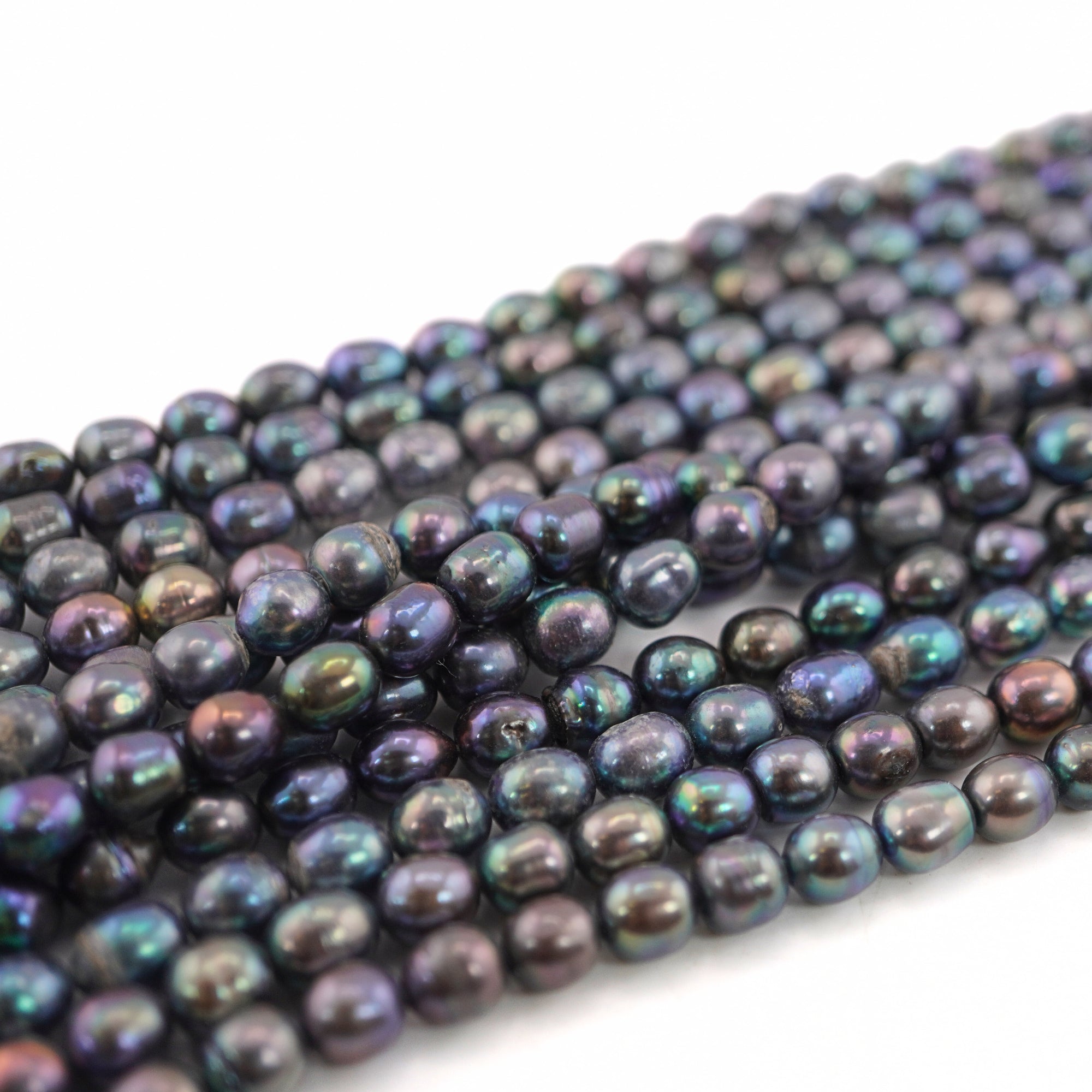 9 x 7 - 7 MM Peacock Oval Freshwater Pearls Beads