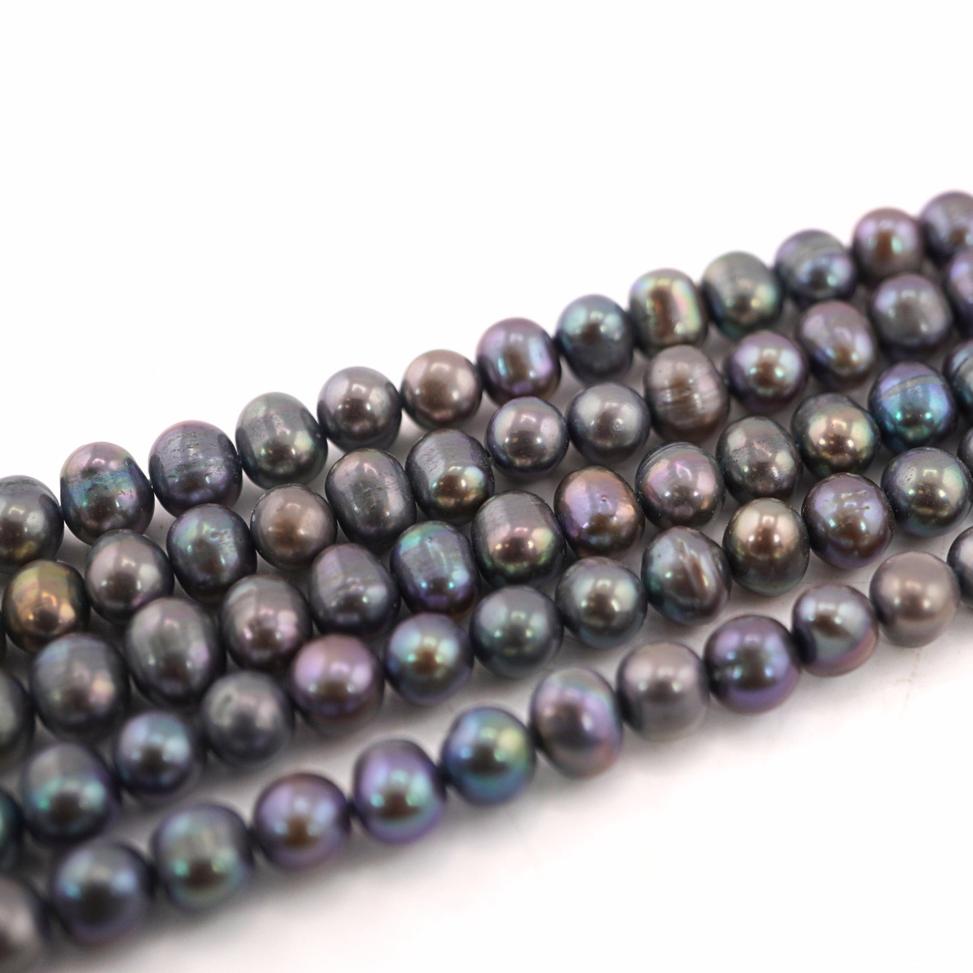 9 x 7 - 8 x 7 MM Peacock Oval Freshwater Pearls Beads