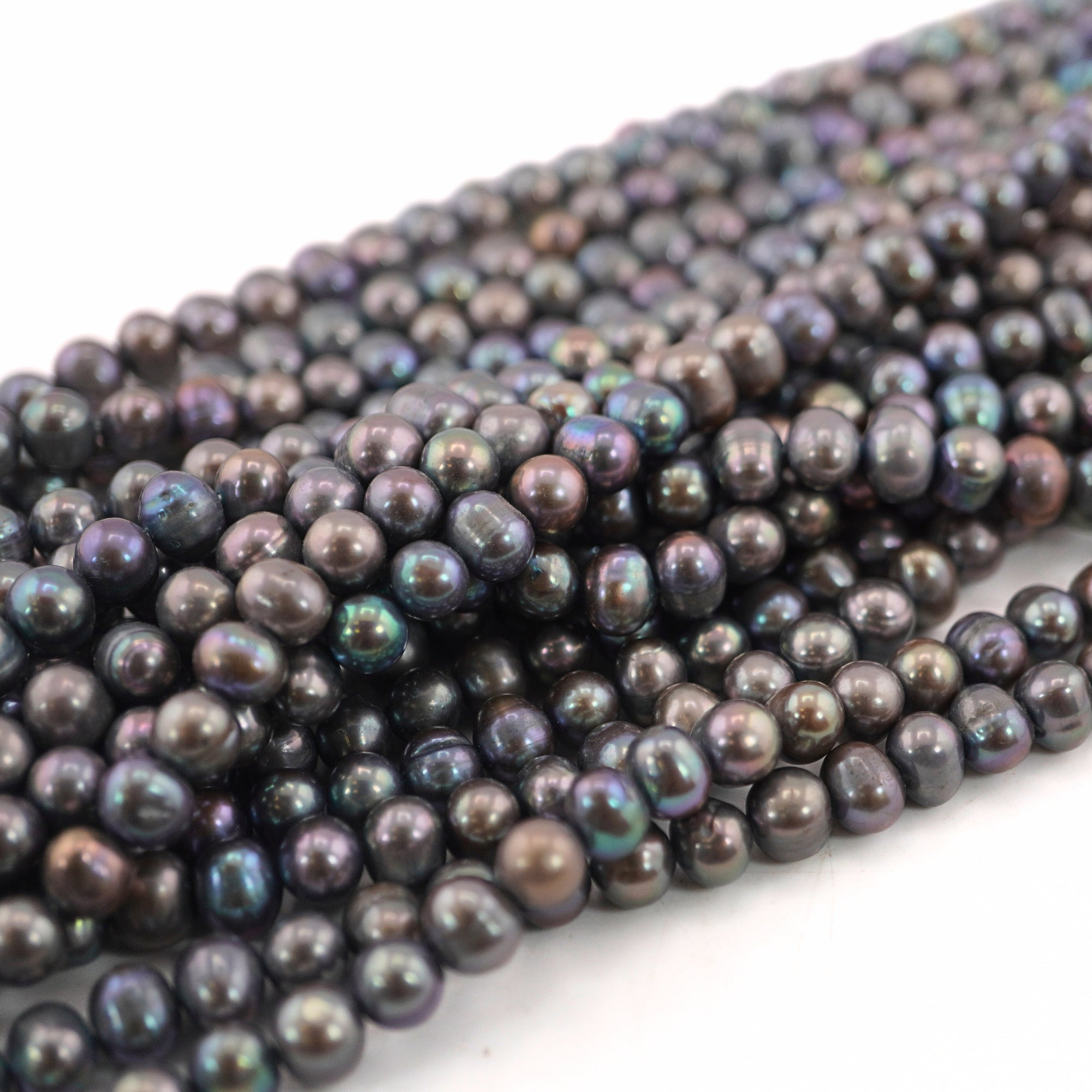 9 x 7 - 8 x 7 MM Peacock Oval Freshwater Pearls Beads