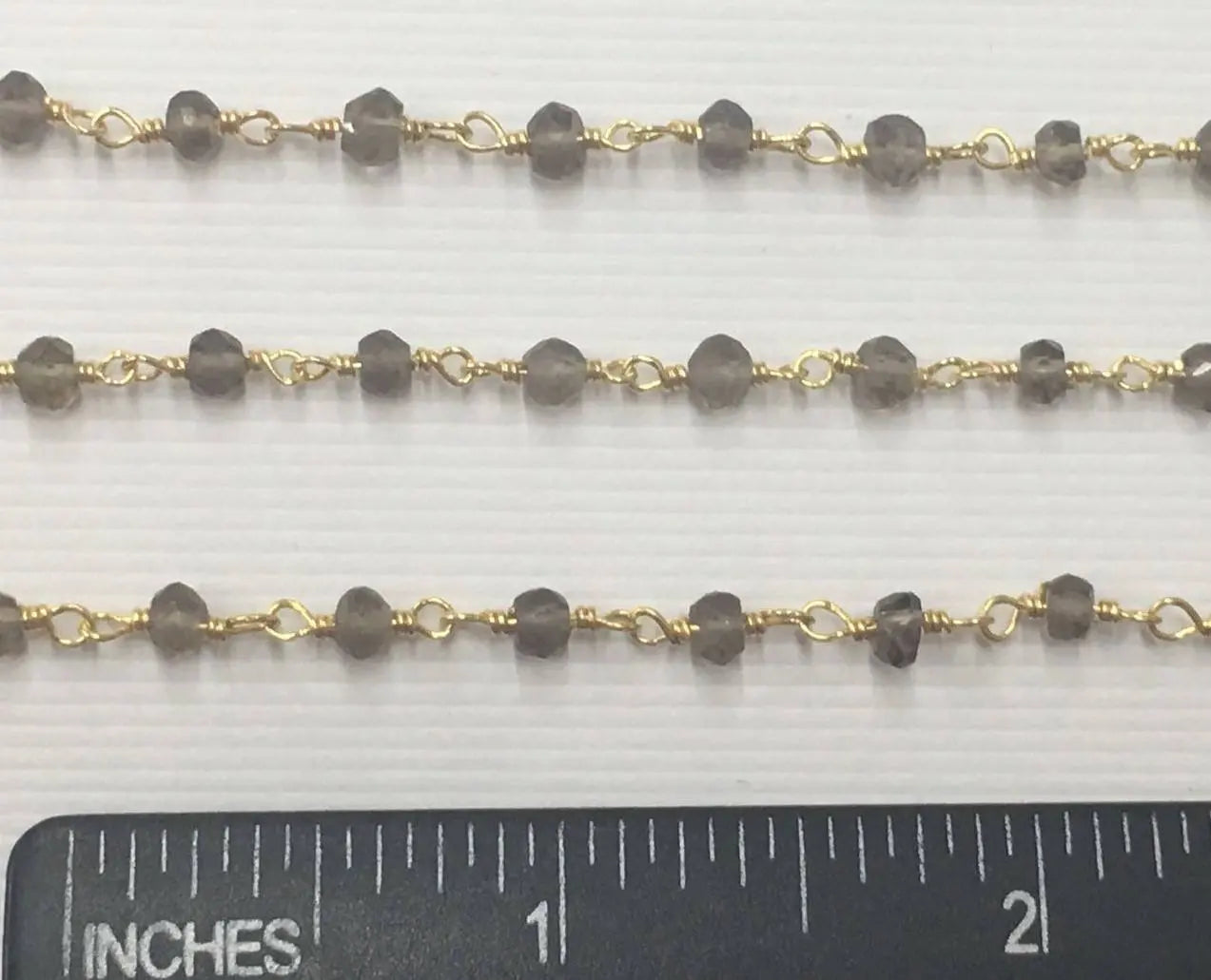Faceted rondelle smoky quartz chain


