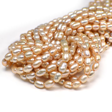 6 x 4 - 7 x 4 MM Light Peach Rice Freshwater Pearls Beads