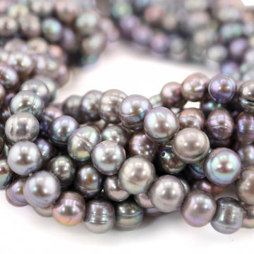 Jewelry making pearls near round


