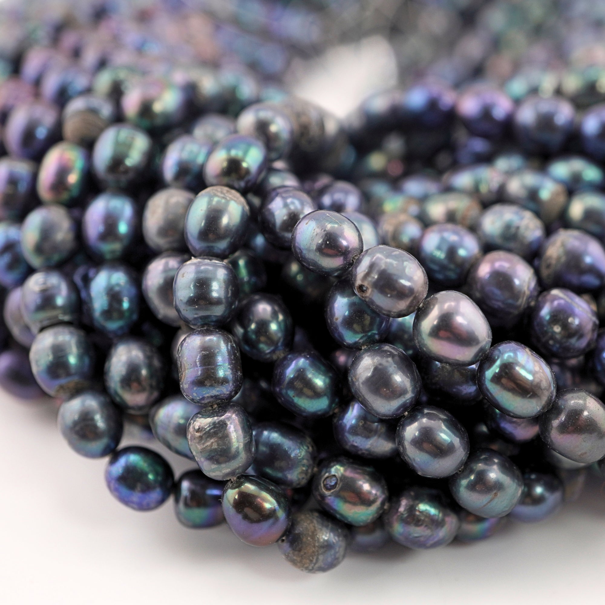 Natural 6 mm oval freshwater pearls

