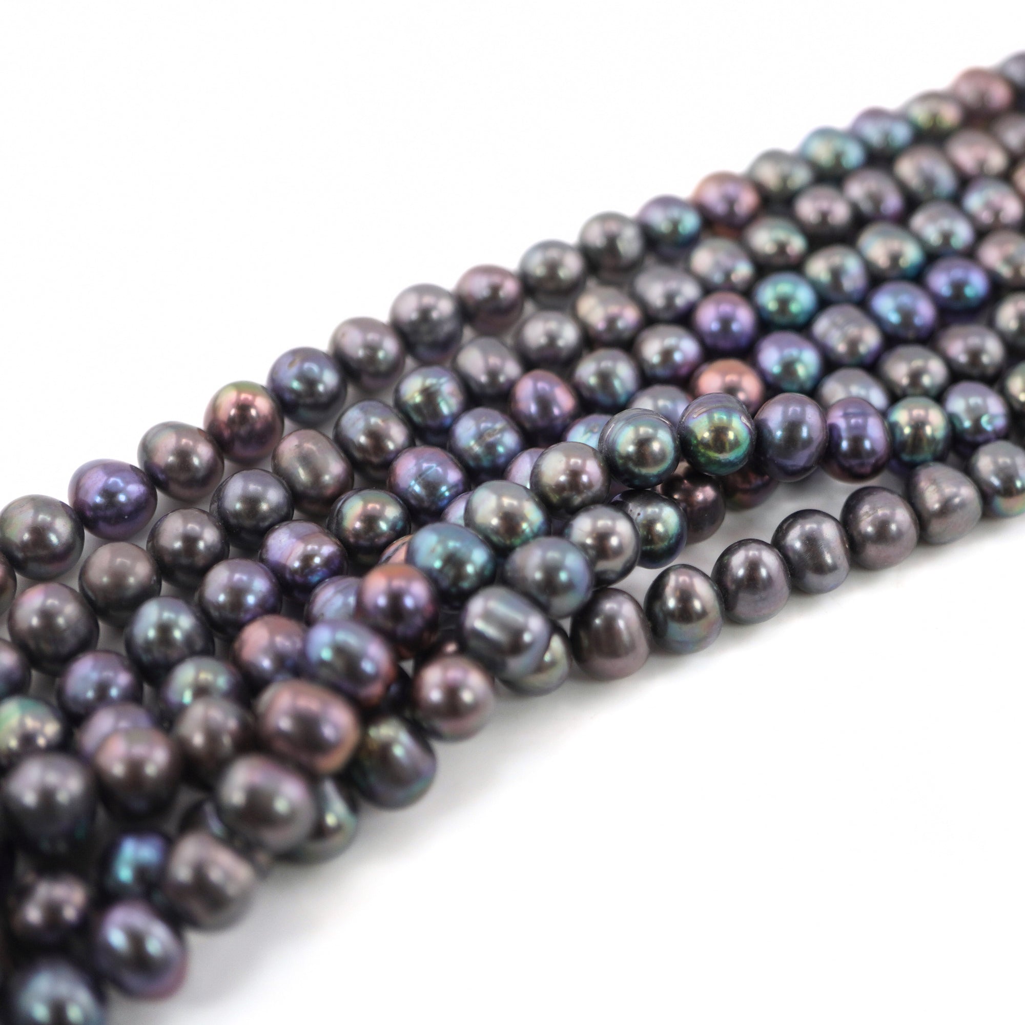 Near round peacock pearl beads

