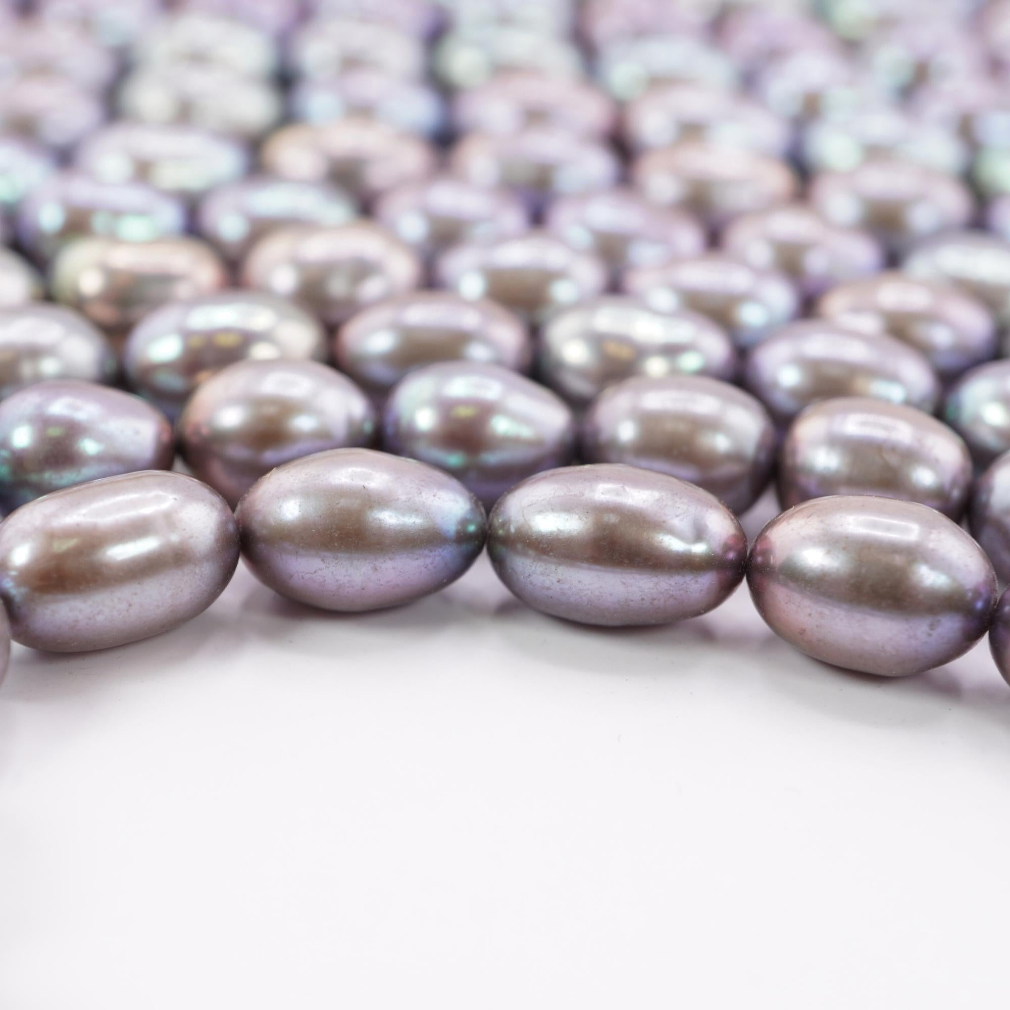 Peacock Freshwater Pearls Oval Shape Smooth Beads