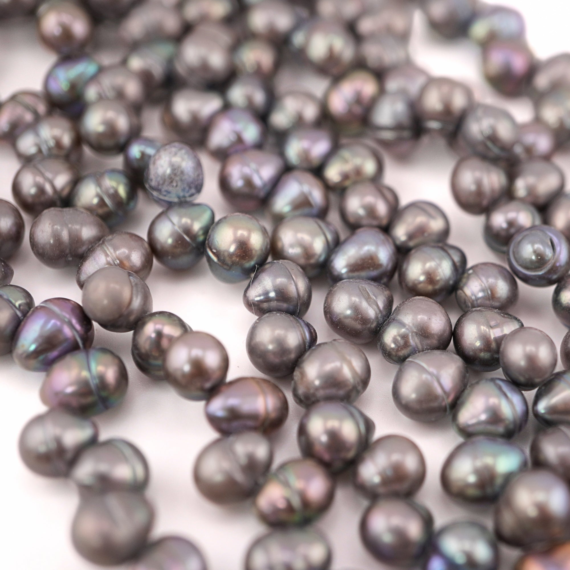 Peacock oval freshwater beads


