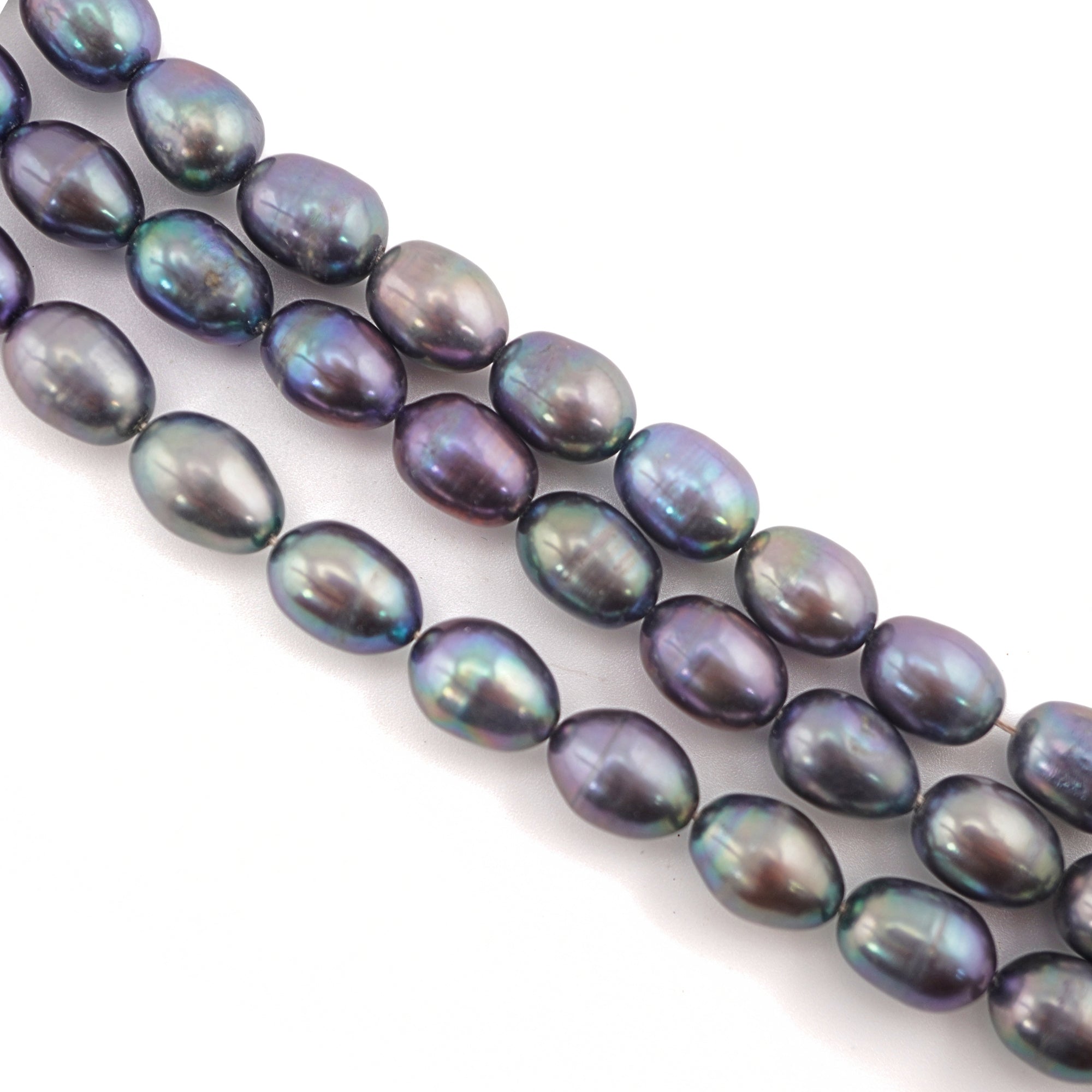 Peacock pearl oval beads strand


