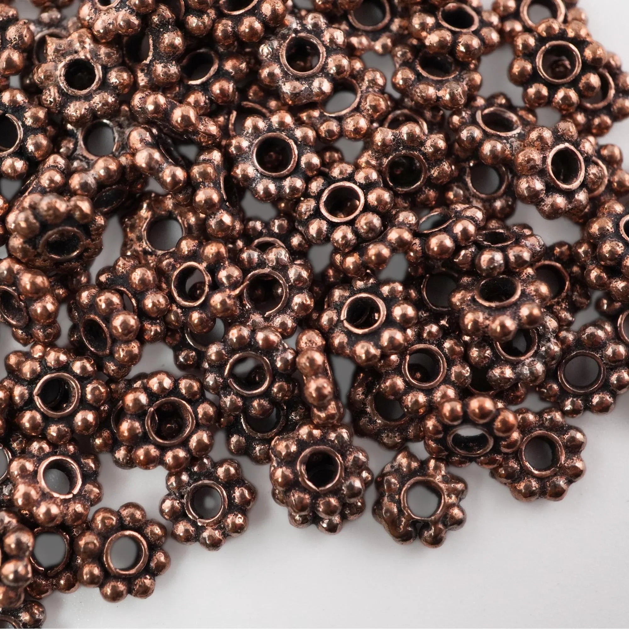Real copper flower beads for DIY crafts

