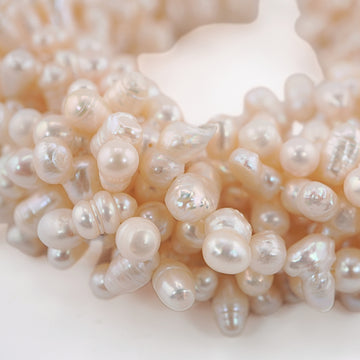 White oval beads for jewelry design

