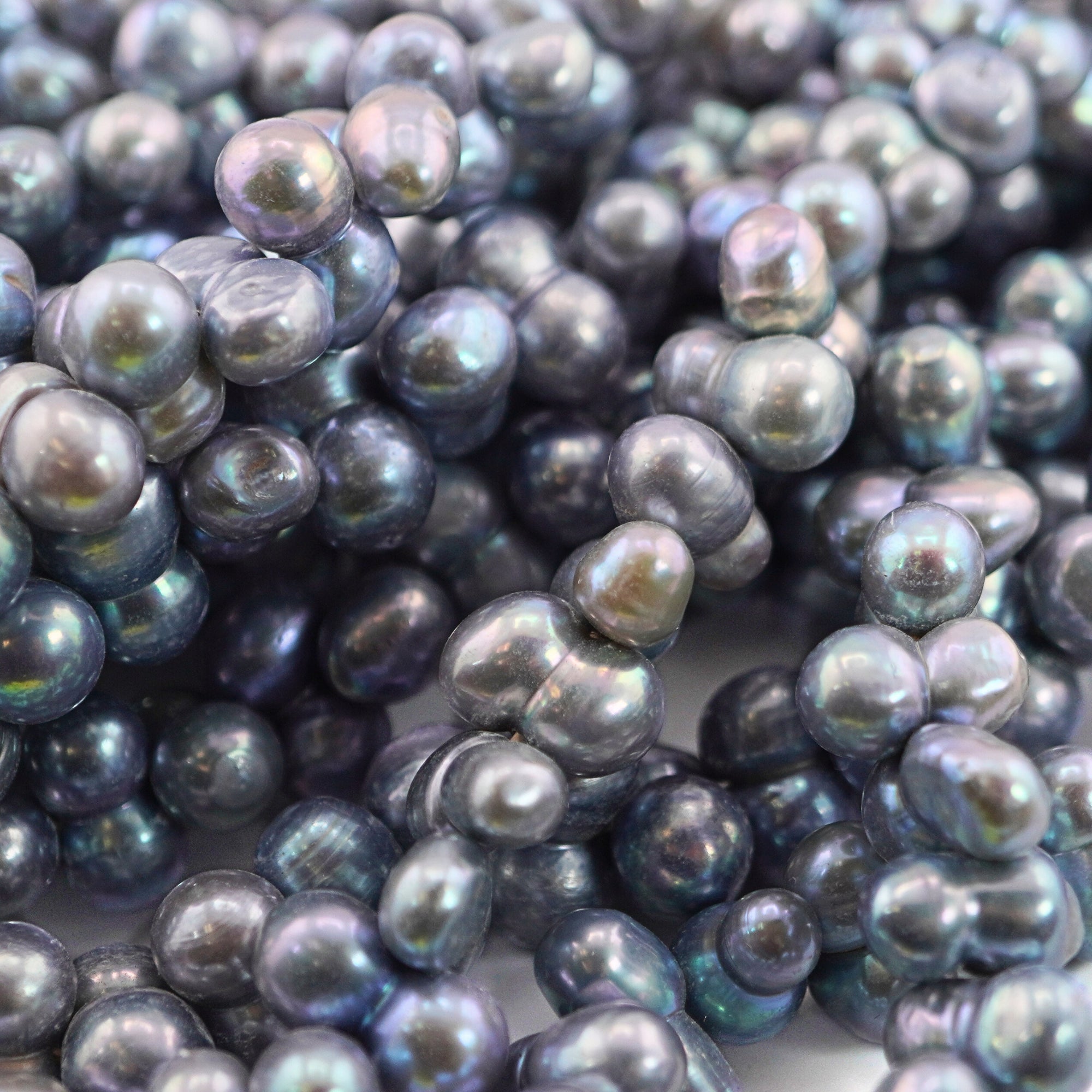 near round peacock pearls strand

