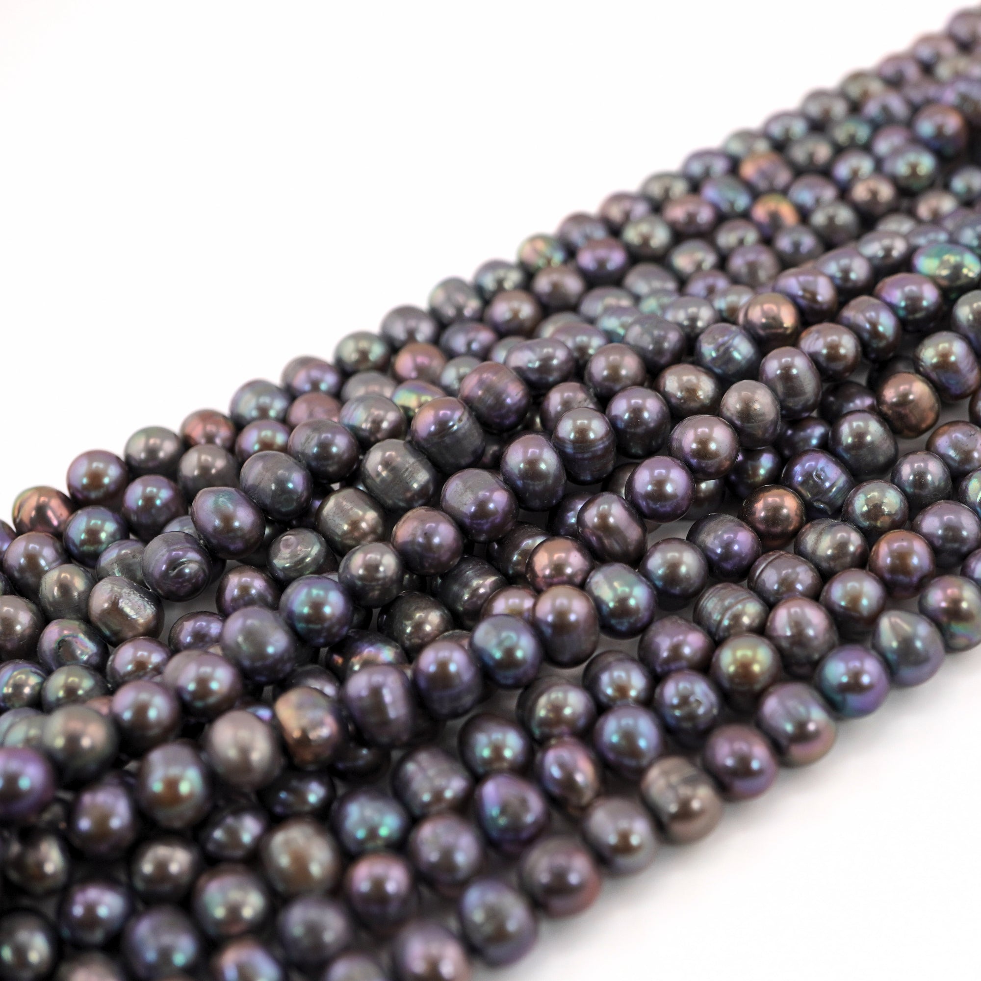 real peacock freshwater pearls close-up

