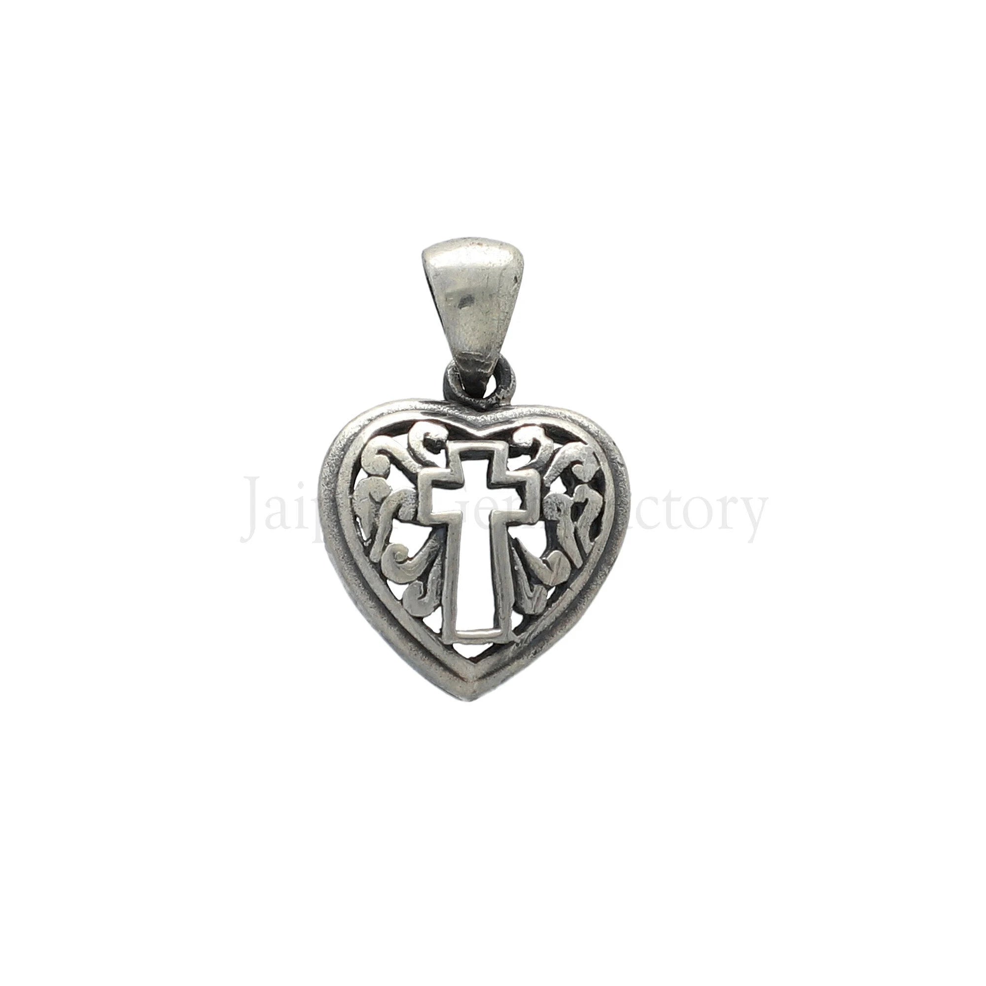 religious heart cross silver pendant

