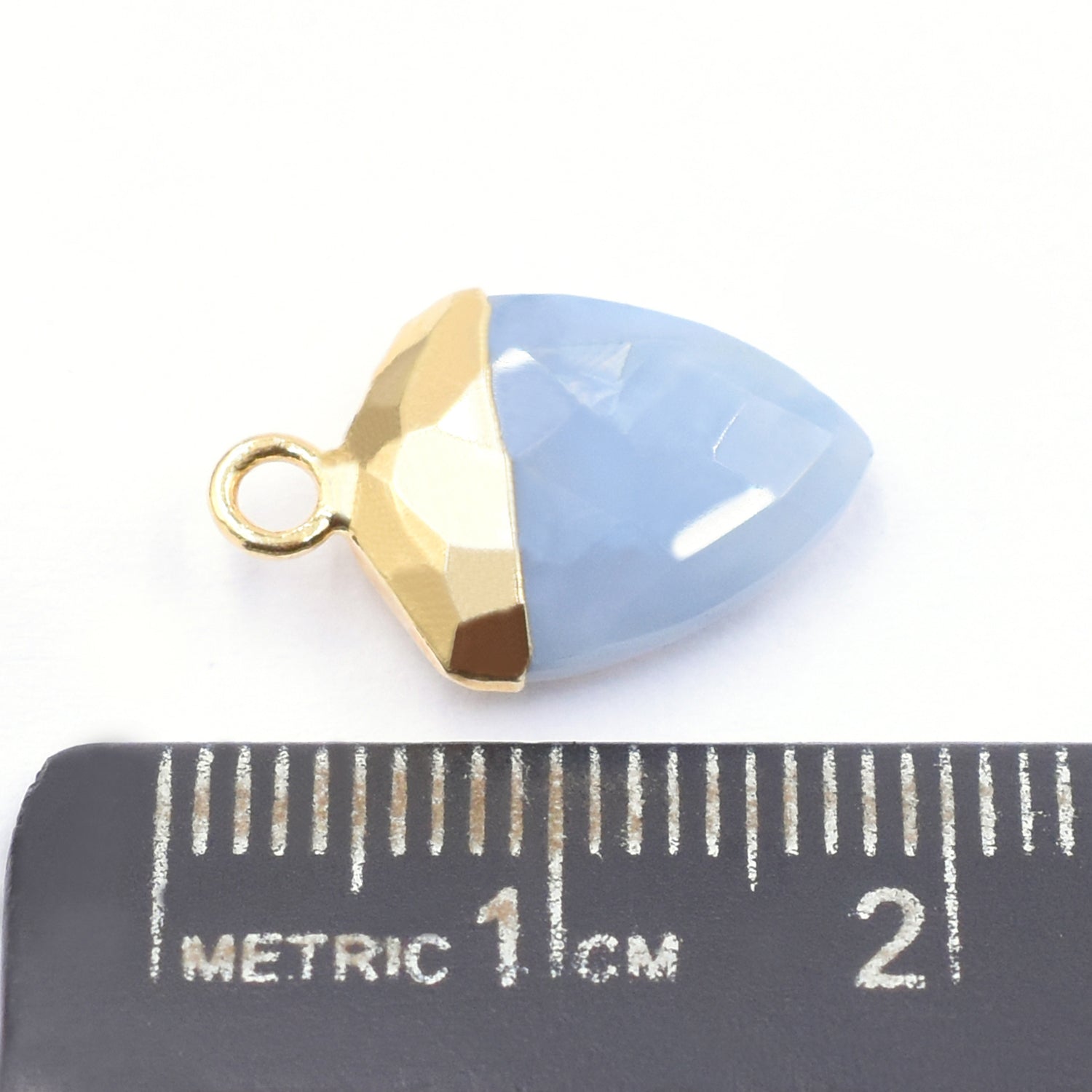 Unique Blue Opal Shield shaped pendant with gold detailing